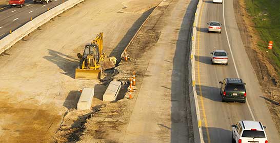 Highway construction with barrier walls